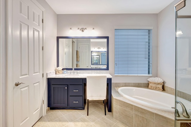 8271 Canopy Ter, Parkland, FL 33076 - full bathroom with vanity, a garden tub, and tile patterned floors