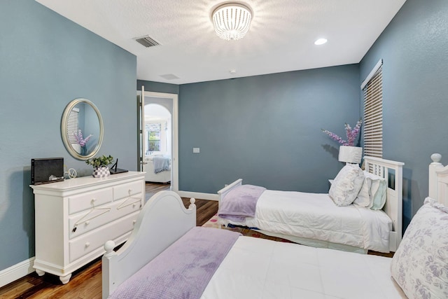 8271 Canopy Ter, Parkland, FL 33076 - bedroom featuring wood finished floors and baseboards