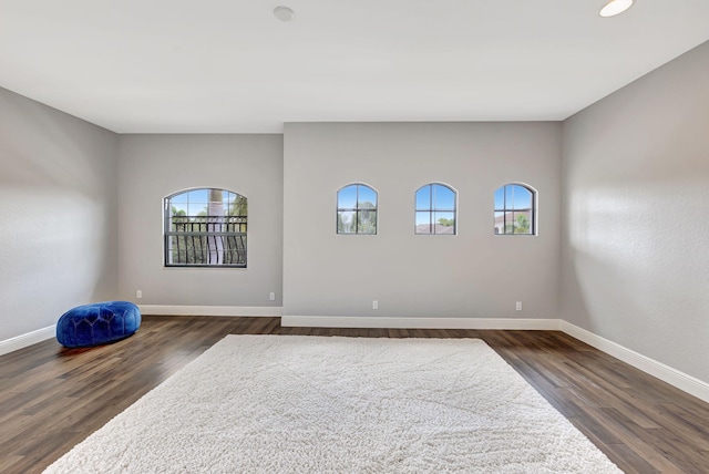 8271 Canopy Ter, Parkland, FL 33076 - spare room featuring baseboards and dark wood-style floors