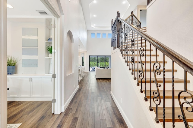 8271 Canopy Ter, Parkland, FL 33076 - foyer entrance with dark wood-type flooring, recessed lighting, stairway, baseboards, and a high ceiling