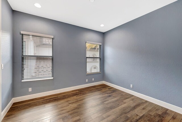8271 Canopy Ter, Parkland, FL 33076 - empty room featuring wood finished floors, baseboards, and recessed lighting