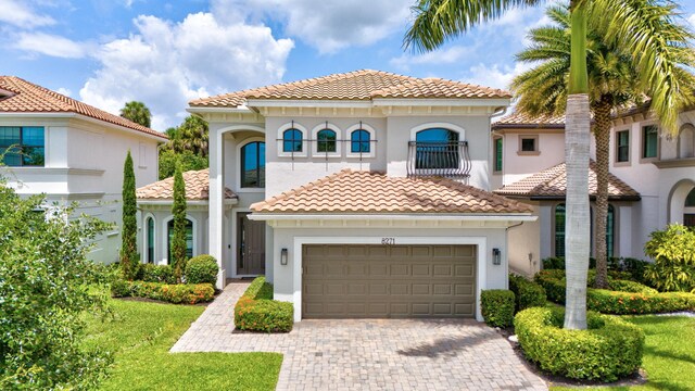 8271 Canopy Ter, Parkland, FL 33076 - mediterranean / spanish house with driveway, a tile roof, stucco siding, and a front lawn