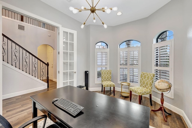 8271 Canopy Ter, Parkland, FL 33076 - office with wood finished floors, a chandelier, baseboards, and arched walkways
