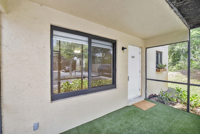 1325 S Flagler Ave Unit 104, Pompano Beach, FL 33060 - doorway to property featuring stucco siding