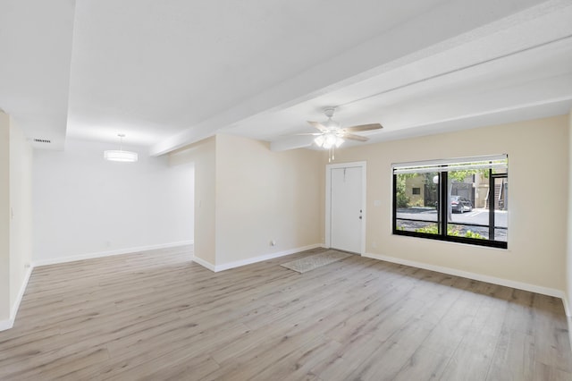 1325 S Flagler Ave Unit 104, Pompano Beach, FL 33060 - spare room featuring light wood finished floors, baseboards, and ceiling fan