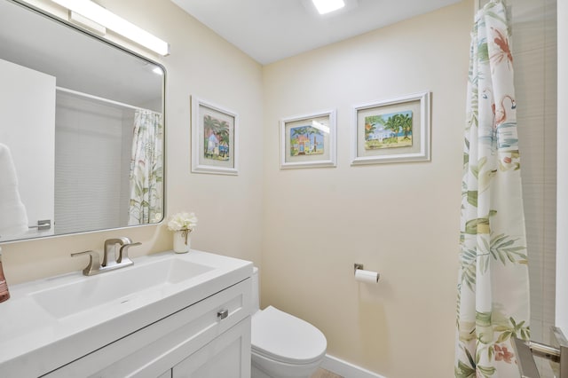 1325 S Flagler Ave Unit 104, Pompano Beach, FL 33060 - bathroom with toilet, vanity, and curtained shower