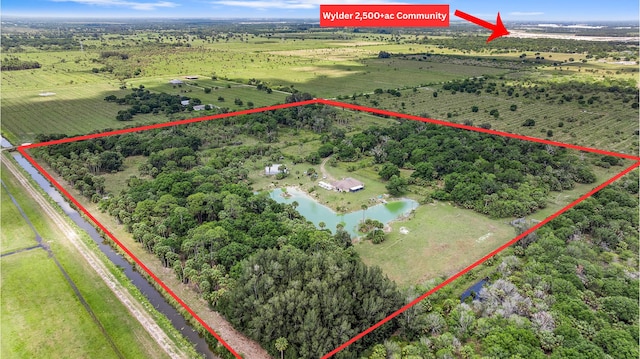 13351 Williams Rd, Port Saint Lucie, FL 34987 - view of rural area featuring property boundaries highlighted and a nearby body of water