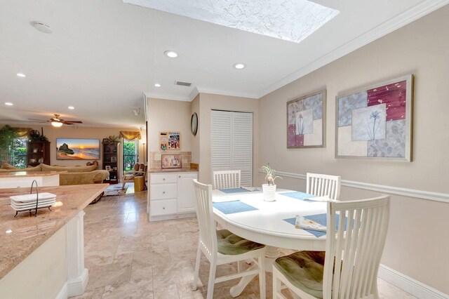 15385 Cedar Bluff Pl, Wellington, FL 33414 - dining room with crown molding, recessed lighting, a skylight, and ceiling fan