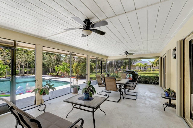 15385 Cedar Bluff Pl, Wellington, FL 33414 - sunroom / solarium featuring outdoor dining area and a ceiling fan