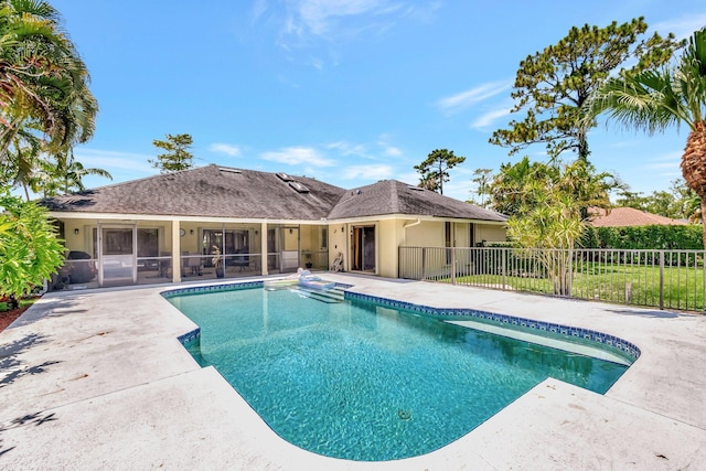 15385 Cedar Bluff Pl, Wellington, FL 33414 - view of pool featuring a patio area, a sunroom, and a hot tub