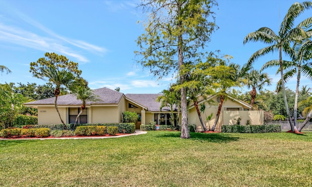 15385 Cedar Bluff Pl, Wellington, FL 33414 - view of front of home featuring stucco siding