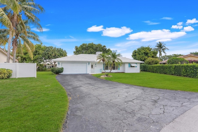 1937 Park Pl, Boca Raton, FL 33486 - ranch-style home featuring an attached garage, asphalt driveway, and stucco siding