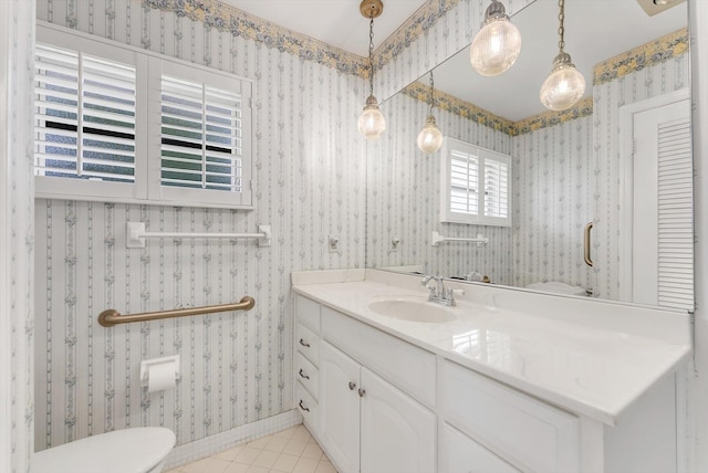 1937 Park Pl, Boca Raton, FL 33486 - bathroom with vanity, toilet, tile patterned flooring, and baseboards