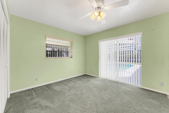 1937 Park Pl, Boca Raton, FL 33486 - spare room with carpet, baseboards, and a ceiling fan