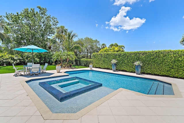 220 Carina Dr, Jupiter, FL 33478 - view of swimming pool featuring a patio and a pool with connected hot tub