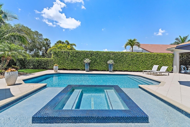 220 Carina Dr, Jupiter, FL 33478 - view of swimming pool with a patio area and a pool with connected hot tub