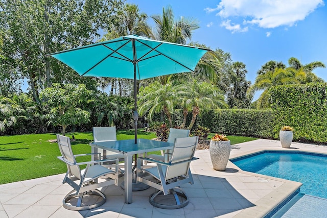 220 Carina Dr, Jupiter, FL 33478 - view of swimming pool with a patio, a lawn, and outdoor dining area