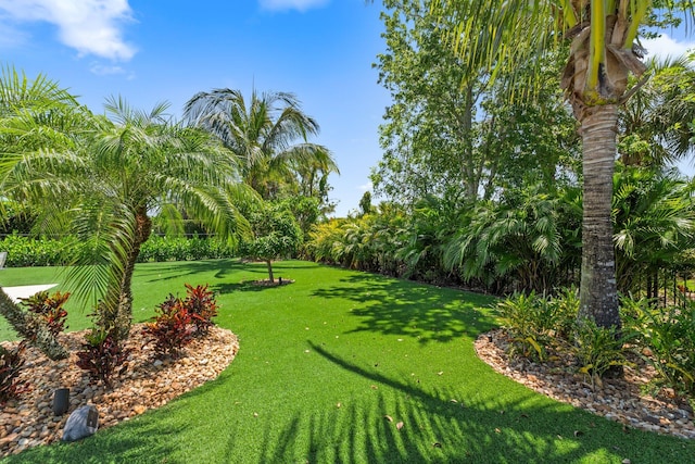 220 Carina Dr, Jupiter, FL 33478 - view of property's community featuring a lawn