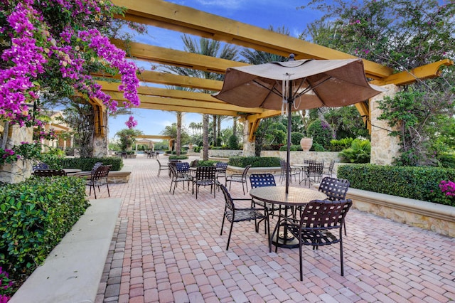 220 Carina Dr, Jupiter, FL 33478 - view of patio / terrace featuring outdoor dining area and a pergola