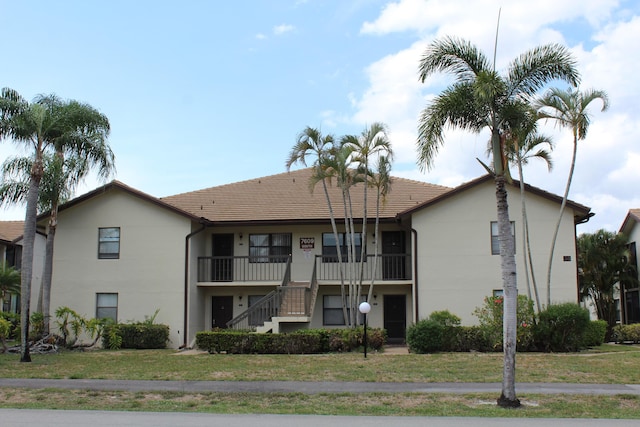 7609 Tahiti Ln Unit 201, Lake Worth, FL 33467 - view of property featuring stairway