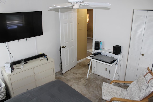 7609 Tahiti Ln Unit 201, Lake Worth, FL 33467 - bedroom with ceiling fan, a closet, and baseboards