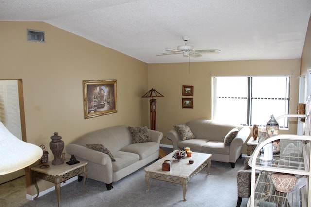 7609 Tahiti Ln Unit 201, Lake Worth, FL 33467 - living area featuring lofted ceiling, a ceiling fan, and carpet flooring