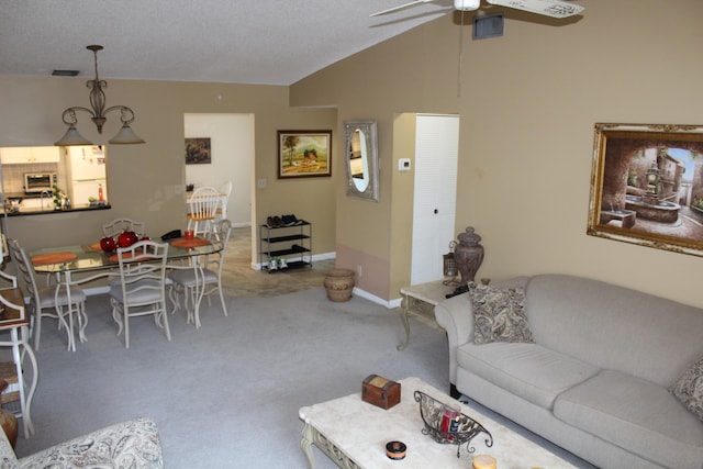 7609 Tahiti Ln Unit 201, Lake Worth, FL 33467 - living room featuring carpet floors, ceiling fan, lofted ceiling, and baseboards