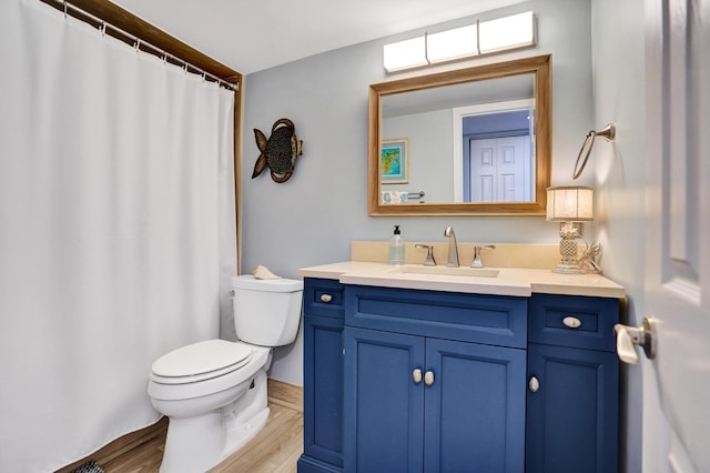 2424 N Federal Hwy Unit 315, Boynton Beach, FL 33435 - full bath with toilet, vanity, and wood finished floors