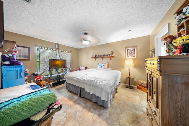 7201 N Blvd, Fort Pierce, FL 34951 - bedroom with ceiling fan, a textured ceiling, and baseboards