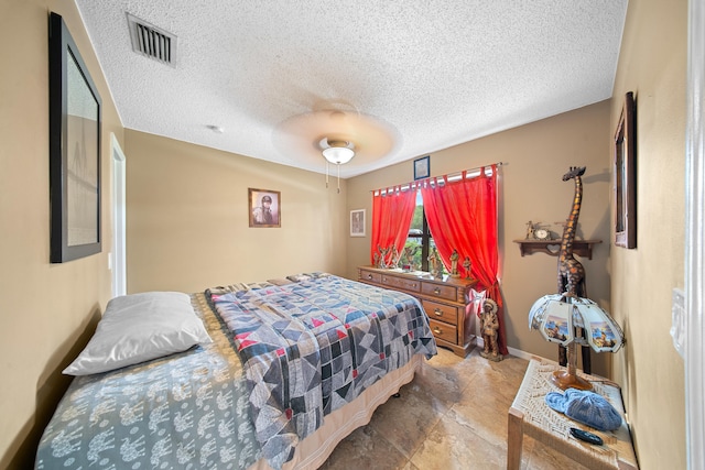 7201 N Blvd, Fort Pierce, FL 34951 - bedroom featuring a textured ceiling, a ceiling fan, and baseboards