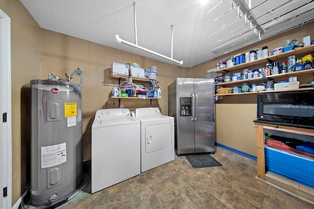 7201 N Blvd, Fort Pierce, FL 34951 - washroom featuring water heater, washer and clothes dryer, and a textured ceiling