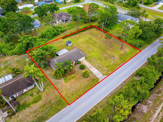 7201 N Blvd, Fort Pierce, FL 34951 - aerial view of property and surrounding area featuring property boundaries highlighted