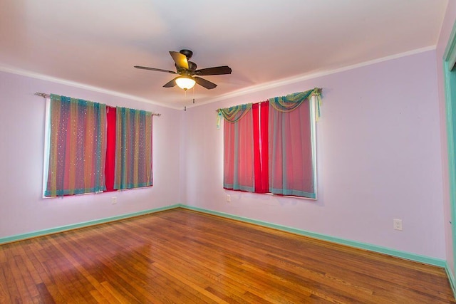 235 30th St, West Palm Beach, FL 33407 - spare room featuring a ceiling fan, ornamental molding, wood finished floors, and baseboards