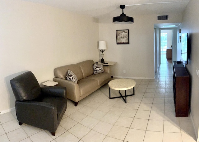 3026 Lincoln B 3026, Boca Raton, FL 33434 - living area featuring light tile patterned flooring and baseboards