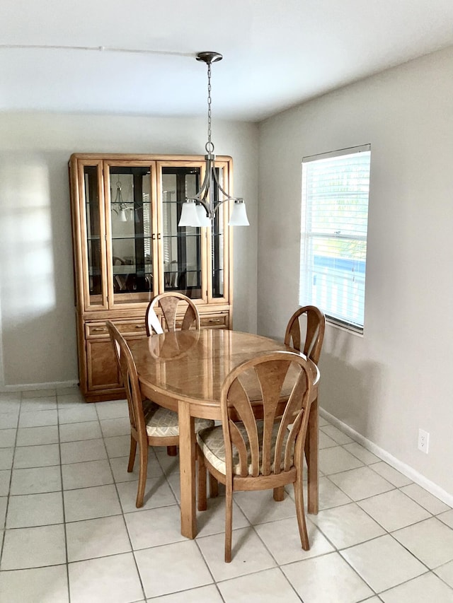 3026 Lincoln B 3026, Boca Raton, FL 33434 - dining area featuring light tile patterned floors and baseboards