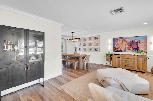 769 Berkeley St, Boca Raton, FL 33487 - living room with ornamental molding, wood finished floors, baseboards, a chandelier, and recessed lighting