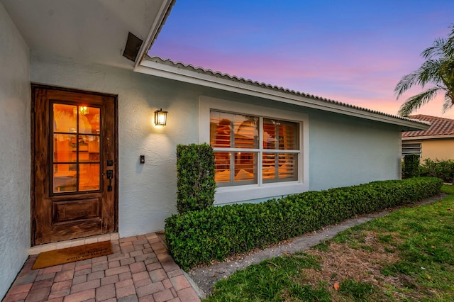 769 Berkeley St, Boca Raton, FL 33487 - view of exterior entry with stucco siding