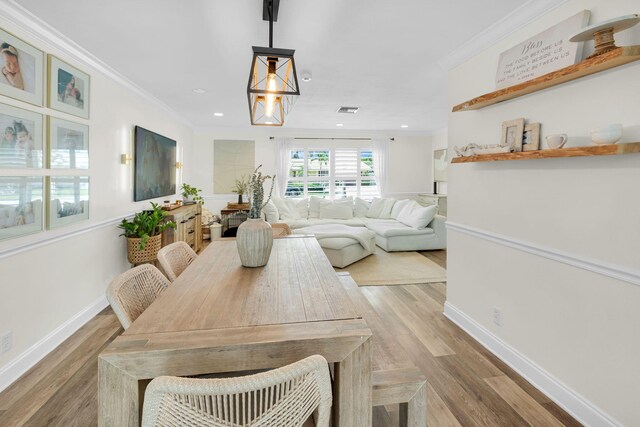 769 Berkeley St, Boca Raton, FL 33487 - dining space featuring crown molding, light wood-type flooring, baseboards, and recessed lighting