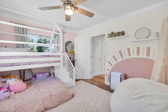 769 Berkeley St, Boca Raton, FL 33487 - bedroom with ornamental molding, wood finished floors, and a ceiling fan