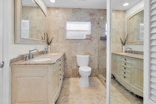 769 Berkeley St, Boca Raton, FL 33487 - bathroom with double vanity, toilet, tile patterned floors, and tiled shower