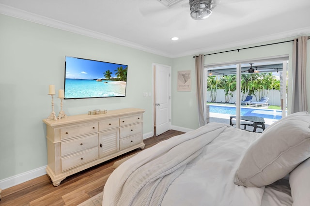 769 Berkeley St, Boca Raton, FL 33487 - bedroom featuring access to exterior, baseboards, ornamental molding, light wood-type flooring, and recessed lighting
