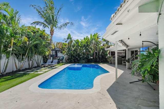 769 Berkeley St, Boca Raton, FL 33487 - view of pool featuring a patio area and a fenced backyard