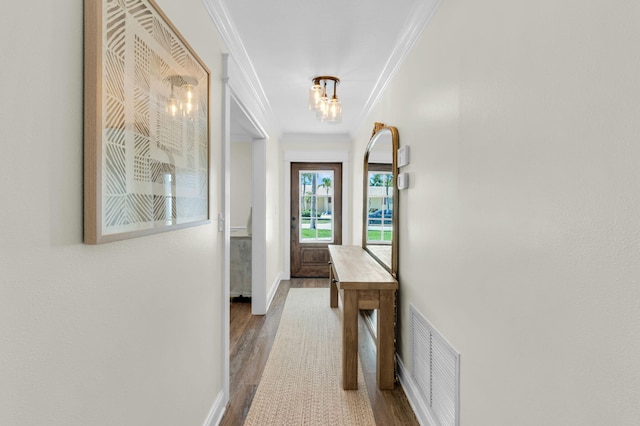 769 Berkeley St, Boca Raton, FL 33487 - hallway featuring crown molding, wood finished floors, and baseboards