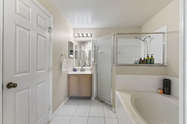 3182 SW Cathedral St, Port Saint Lucie, FL 34953 - bathroom featuring a shower stall, vanity, a bath, a textured ceiling, and tile patterned floors