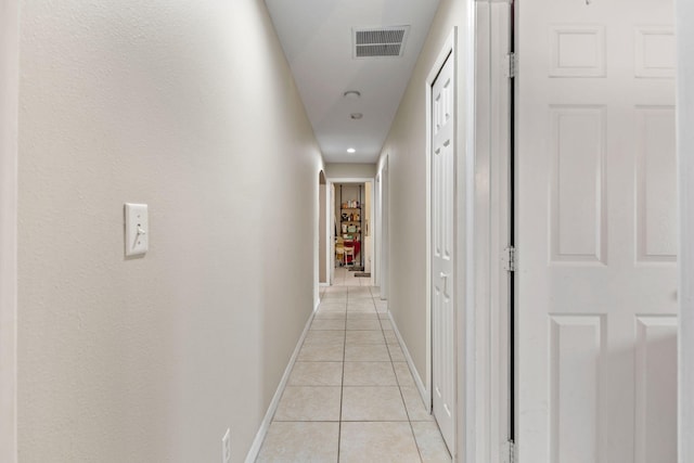 3182 SW Cathedral St, Port Saint Lucie, FL 34953 - hall with light tile patterned floors and baseboards
