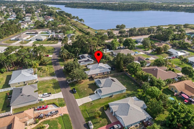 3182 SW Cathedral St, Port Saint Lucie, FL 34953 - aerial overview of property's location with nearby suburban area and a nearby body of water