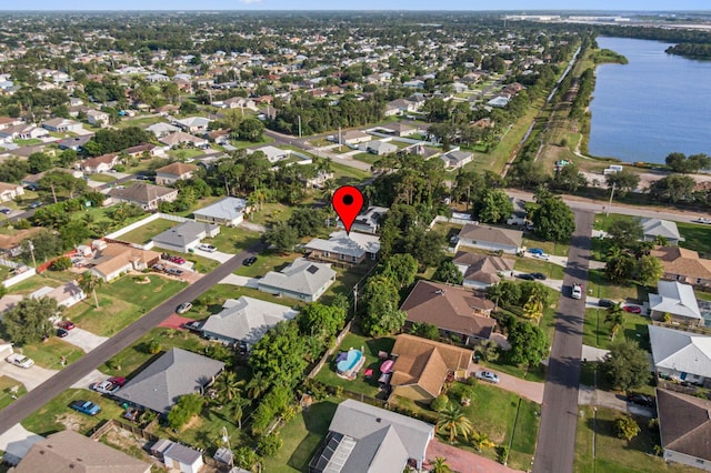 3182 SW Cathedral St, Port Saint Lucie, FL 34953 - aerial view of property's location featuring a nearby body of water and nearby suburban area