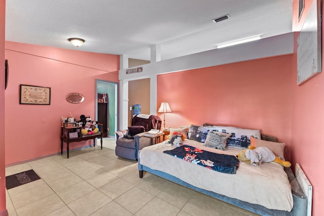 3182 SW Cathedral St, Port Saint Lucie, FL 34953 - bedroom with light tile patterned floors