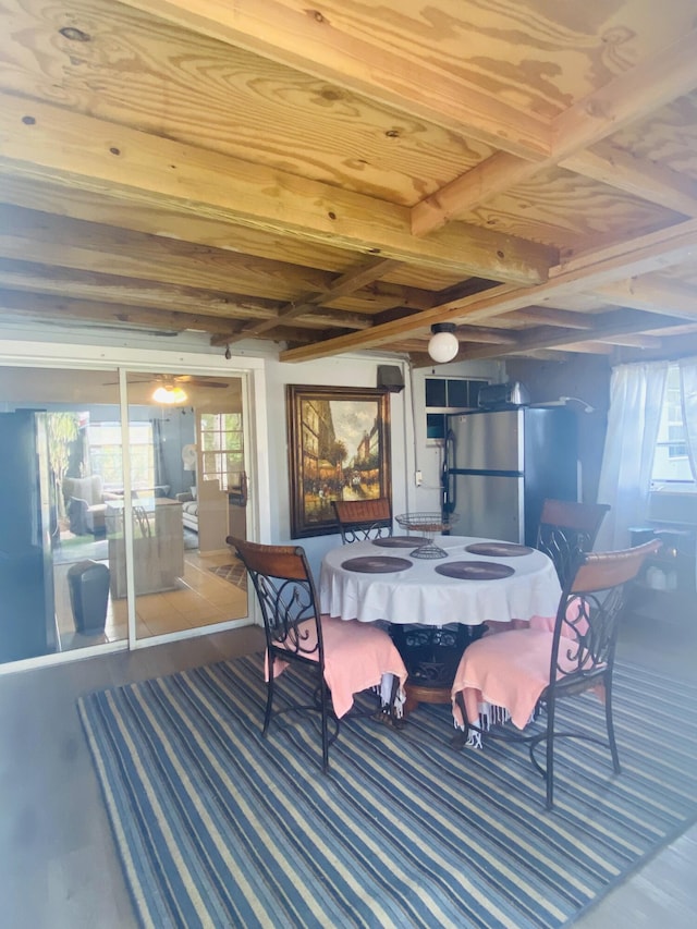 3093 SW Berry Ave, Palm City, FL 34990 - dining area with wood ceiling with exposed beams and wood finished floors