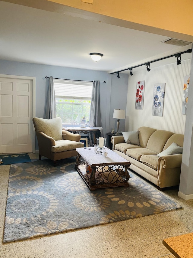 3093 SW Berry Ave, Palm City, FL 34990 - living area featuring track lighting and speckled floor